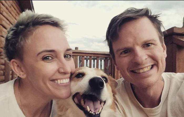 Pete O’Dea with a dog and another person