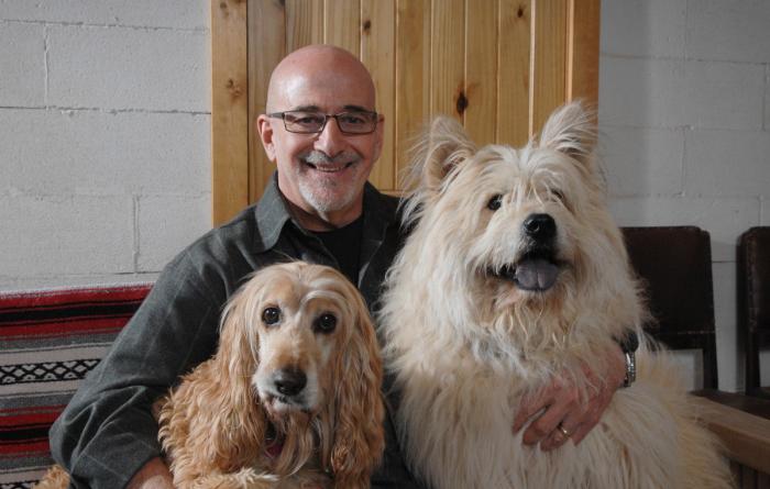 Best Friends co-founder Francis Battista with two of his dogs