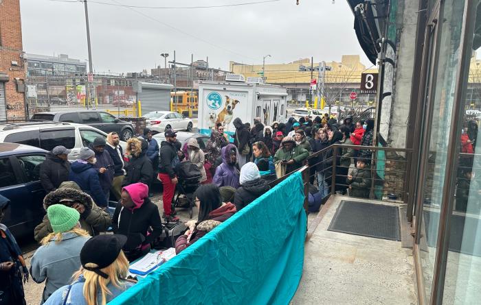 People waiting in line waiting to attend the adoption event in Brooklyn