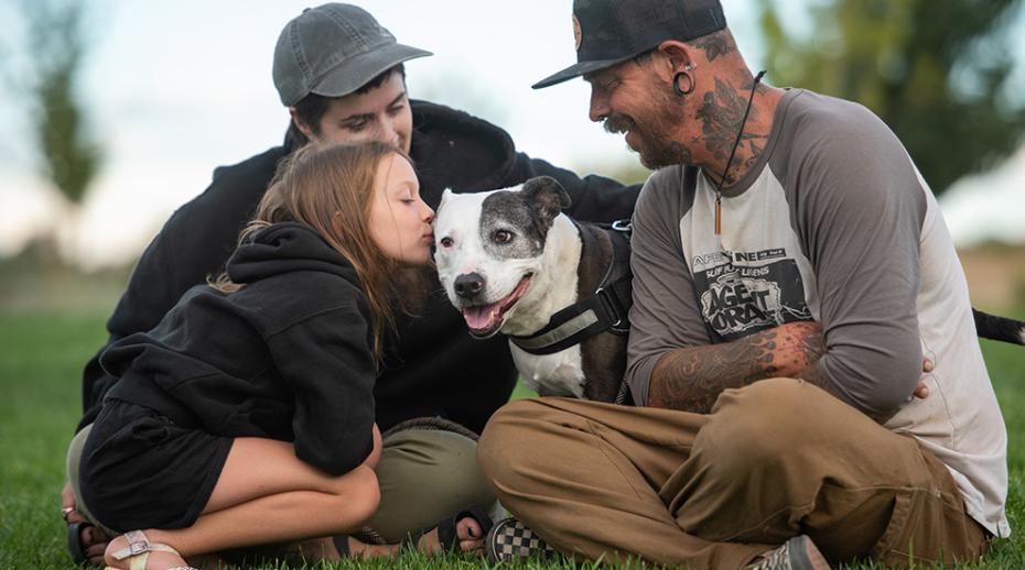 Family with newly adopted shelter dog, Rosita