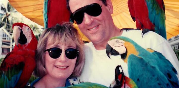 Sharon, who left a legacy gift to the animals in her will, her husband, and a parrot