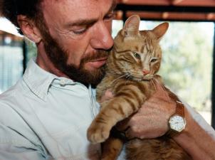 Co-founder Michael Mountain holding Julius the cat