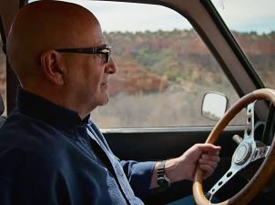 Man driving through canyon