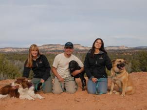 Sherry, John, and Michelle with dogs who had been featured in DogTown