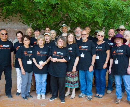 Group of the co-founders at Angels Landing all wearing Best Friends 20+ years of service T-shirts