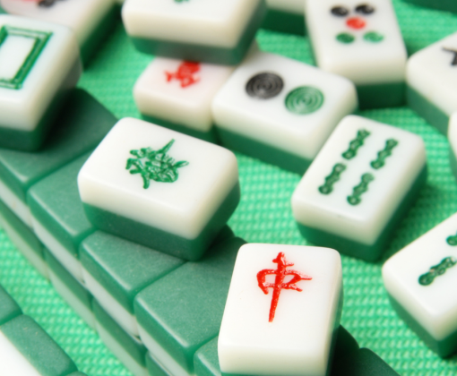 Mahjong tiles on a green background