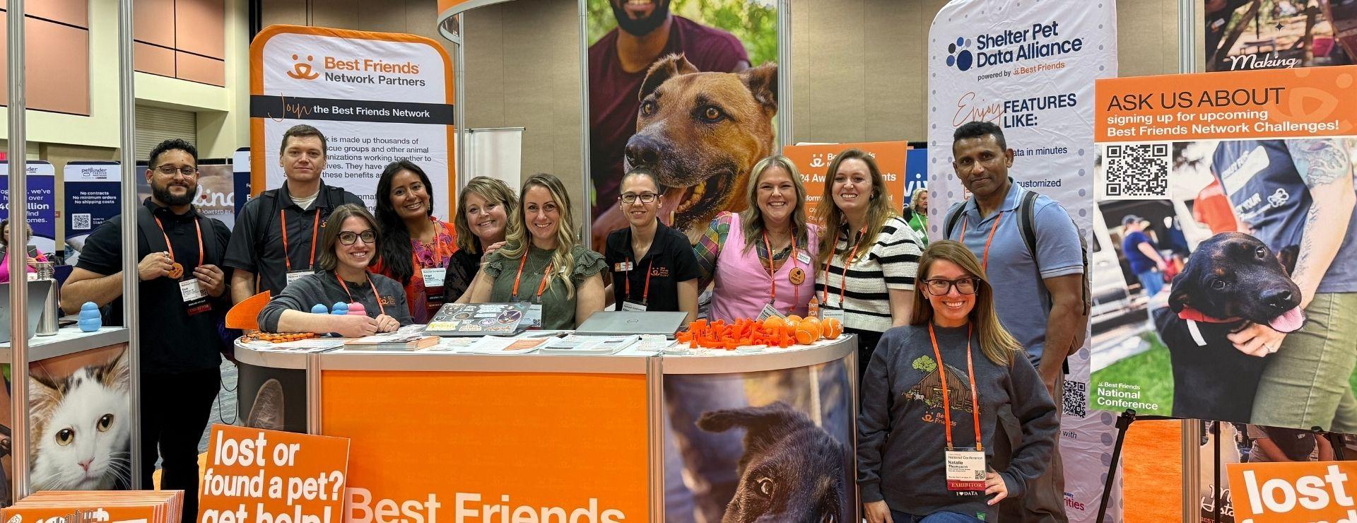 Photo of team members at the Network booth during 2025 Best Friends National Conference