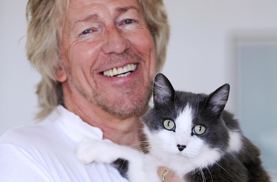 Gabriel de Peyer holding a cat