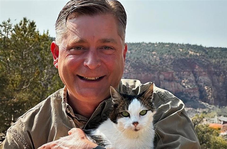 Mark Ebbs holding a cat