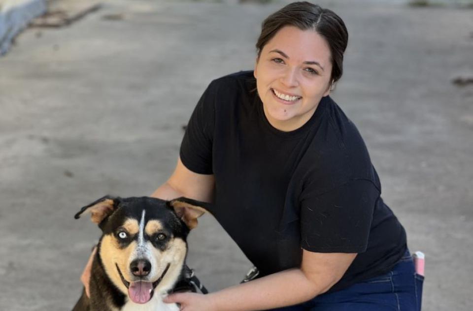 Courtney Gawel with a brown, tan and white dog