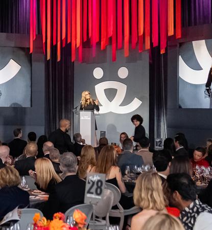 Julie Castle addressing the audience at the Benefit to Save Them All in 2025