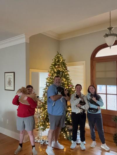 Tilly cozying up with her family for the holidays