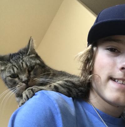 Adair the cat on Matt's shoulder