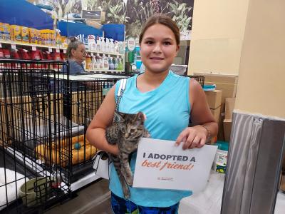 Etoufee the cat being adopted