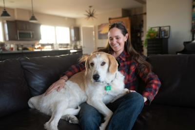 Greenie the dog on Emery's lap