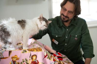 Jesse petting Bubba the cat