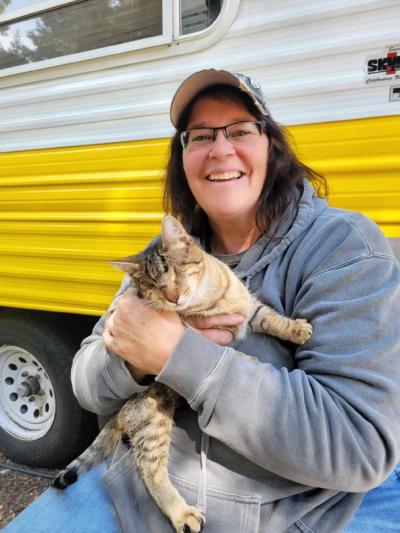 Stormy Shafer holding Tallie the cat