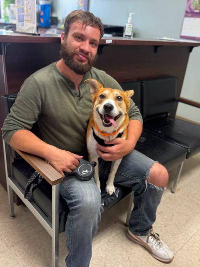 Wiley the dog and his adopter