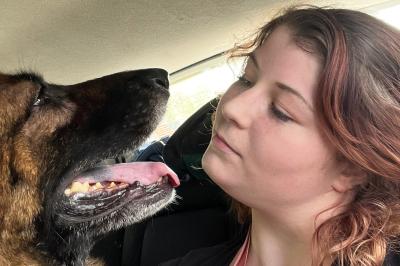 Merlot the dog and Morgan looking at each other