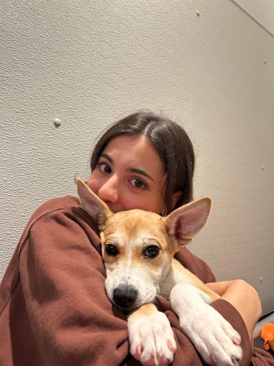 Lauren snuggling with Eloise the puppy
