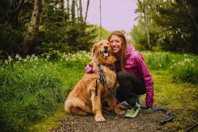 Emily Keddie hugging a dog