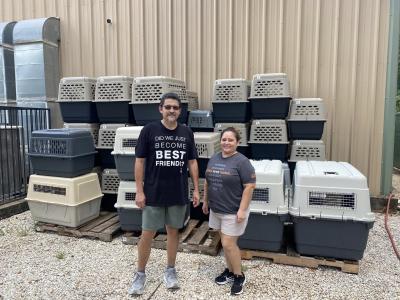 The Galvan family volunteered their time to assemble hundreds of kennels used to transport pets to the mega adoption event.