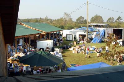 Buildings and trailers used as the staging area for Best Friends and the rescued animals, with lots of boxes of supplies piled around