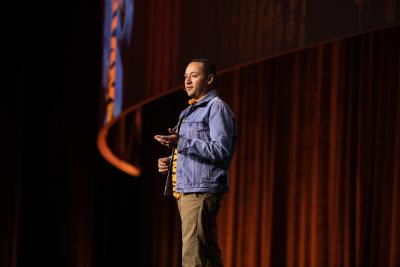 Omar Polio addressing the audience at the Best Friends National Conference