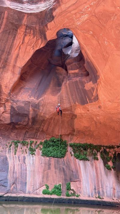 Julie Castle rappelling into the Golden Cathedral