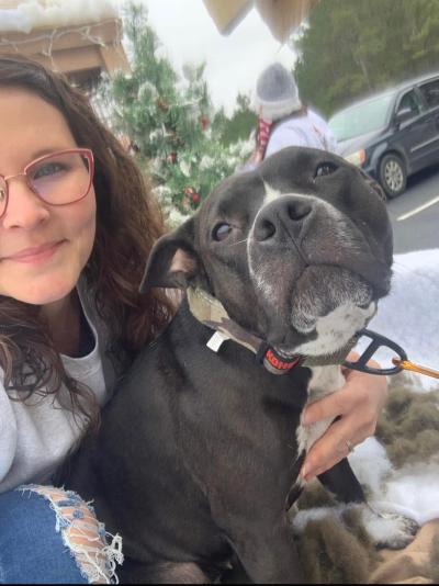 Ruby Fooks with a black and white dog