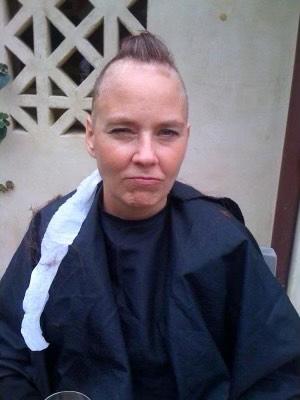 Best Friends CEO Julie Castle with her head partially shaved