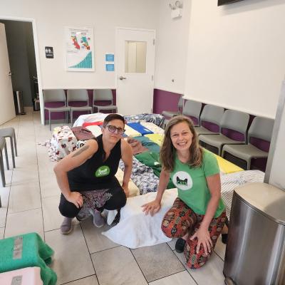 Liz and Erica at a clinic, in a room with covered traps