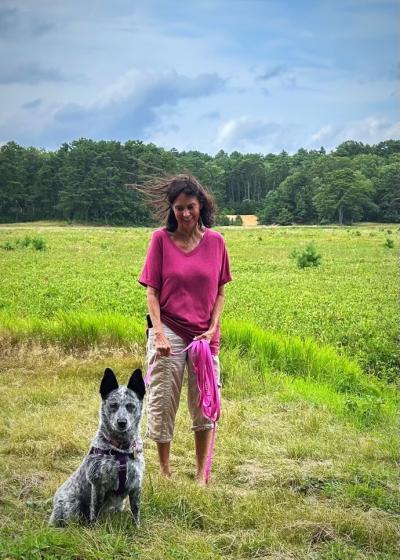 Caroline Martin outside with Mae Belle the dog
