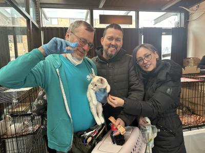 Elvira the cat being adopted at the New York City adoption event