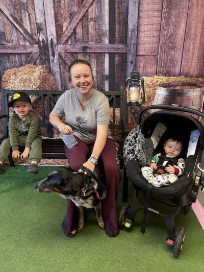 Family with a dog who was fostered and then adopted