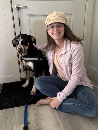 Pixie the dog with her adopter