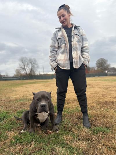 Trainer Adriana Grassi Mosley and Rocket who got adopted from Project Homebound