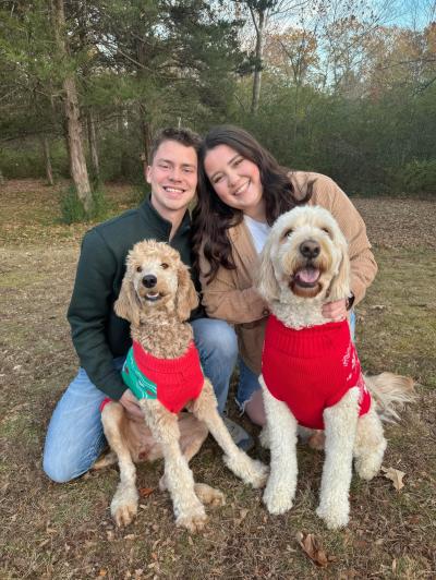 Emily Roberts and Dylan McCay with Maple and another dog
