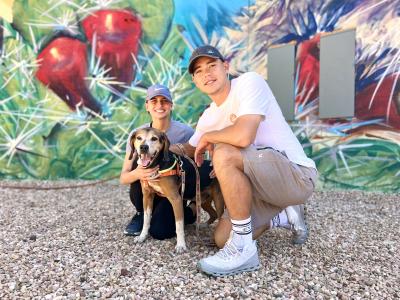Sam Junqua and Emma Besier with a dog