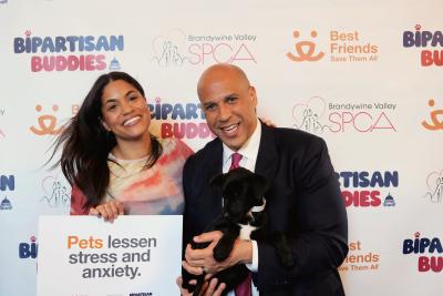 Senator and Alexis Booker with a puppy from Brandywine Valley SPCA