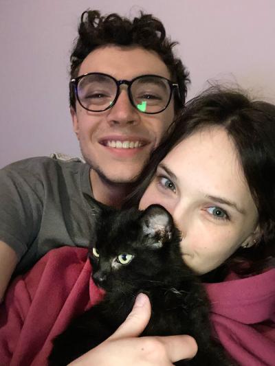 Thistle with her two adopters