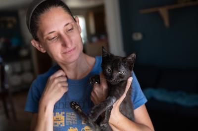 Tina holding her foster kitten Cubby