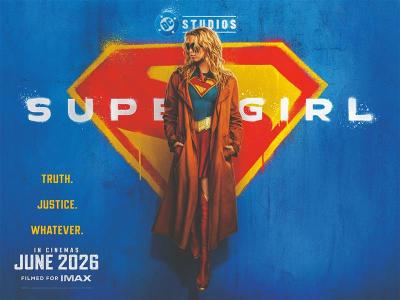 DC Studios promotion for Supergirl with Supergirl in front of the S emblem along with the text, 'Truth. Justice. Whatever.' and the opening date