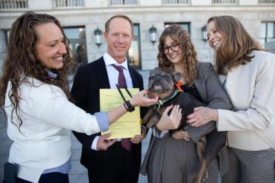 Best Friends team with Utah Senate Bill 201 and a French bulldog at the Utah Capitol 
