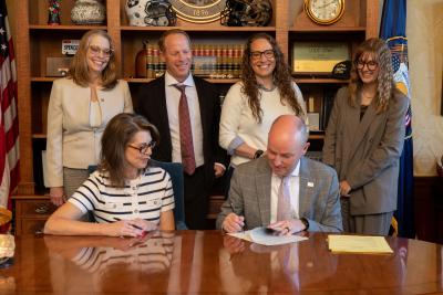 Utah Senate Bill 201 being signed