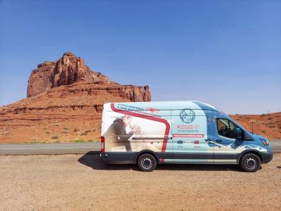 Western Agency Spay/Neuter and Pet Resource Center Nuzzles & Co van in front of a red bluff