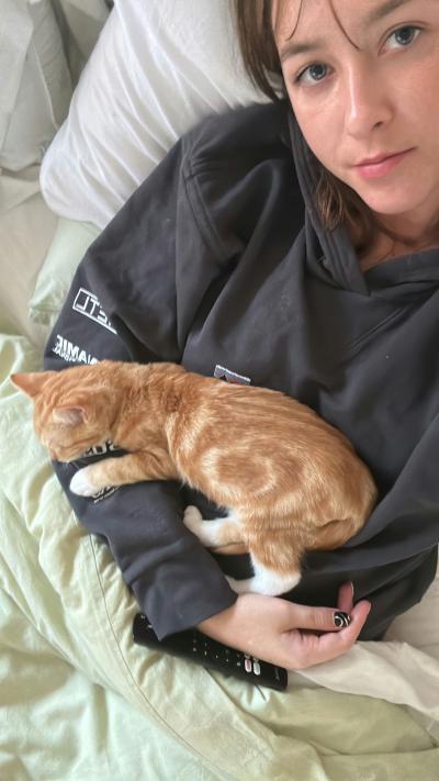 Volunteer Michaela Barrett with foster kitten