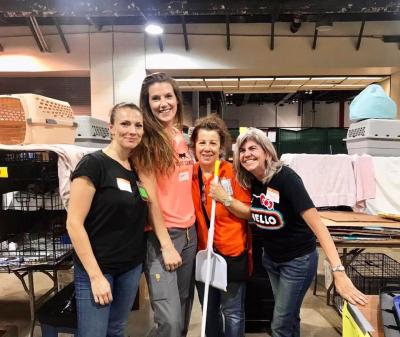 Volunteer Cathy Berry with three other people helping in Houston after Hurricane Harvey