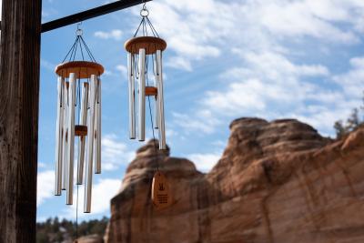Wind chimes in front of a blue sky at Best Friends Animal Sanctuary