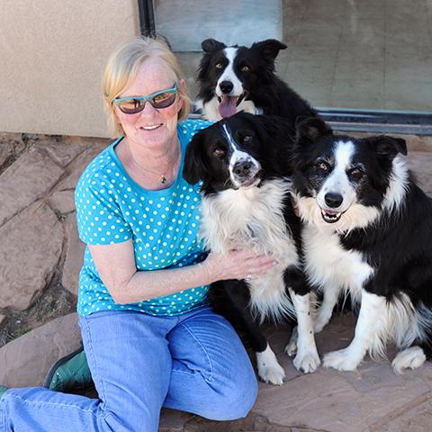 Diana Asher with three dogs